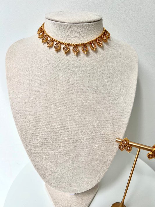 VIMSHA- Dainty simple golden necklace embellished with champagne stones and paired with flat earrings N3254