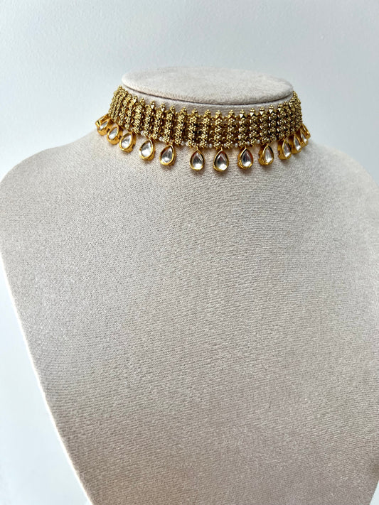 SANTHIYA- golden tear drop Kundan stoned necklace with matching small flat earrings N3300