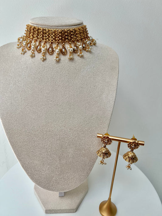 MALANI- Golden high neck band necklace embellished with dangling pearls, comes with matching small jhumkas N3296