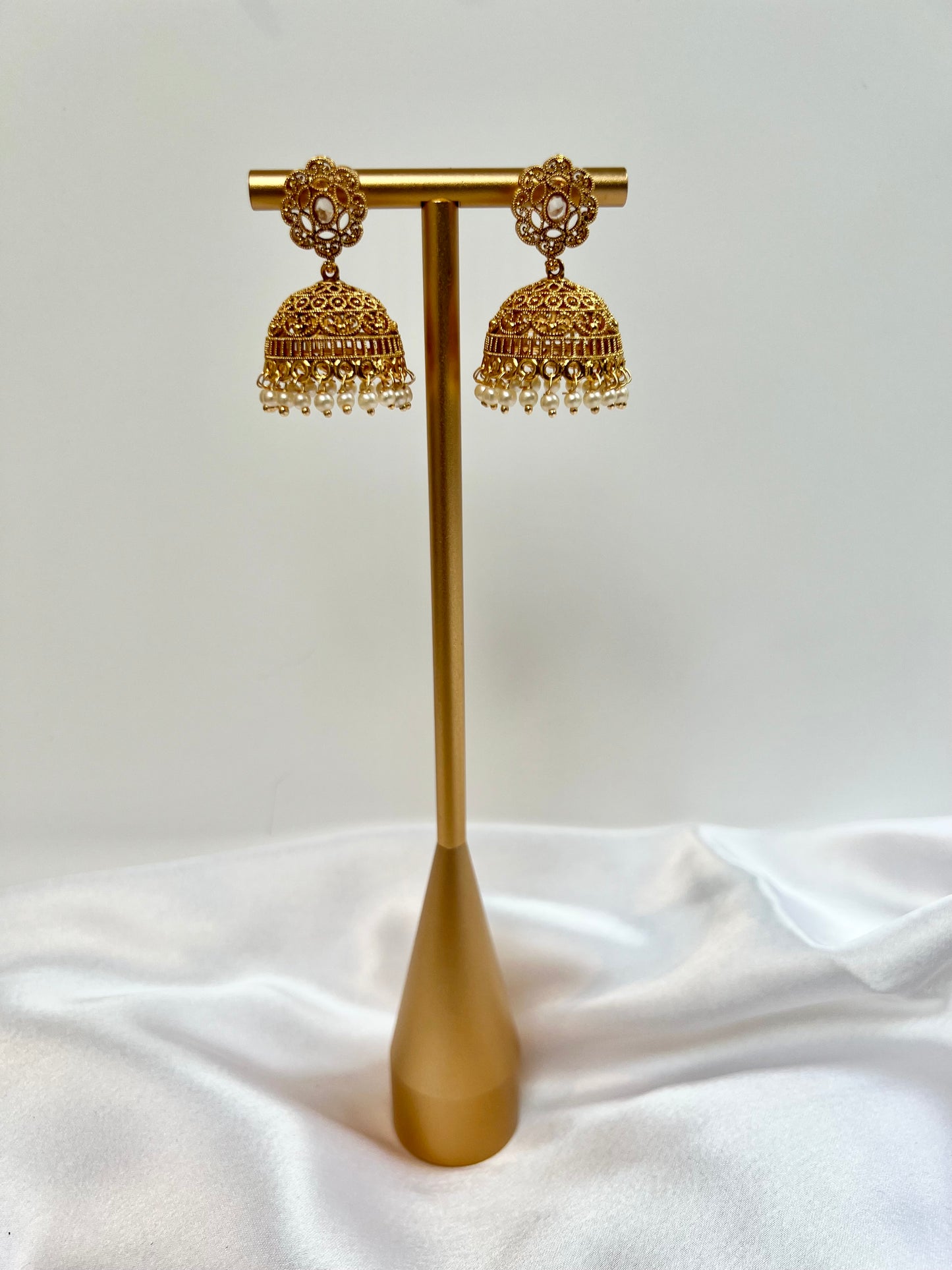 Classic simple golden jhumkas with pearls E3036