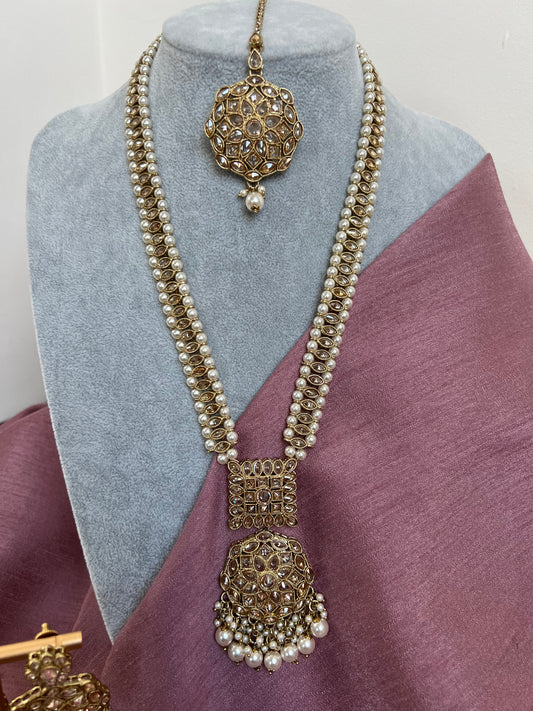 Antique mehndi plated long necklace set with clear stones, pearls and a pair of earrings and tikka N3002