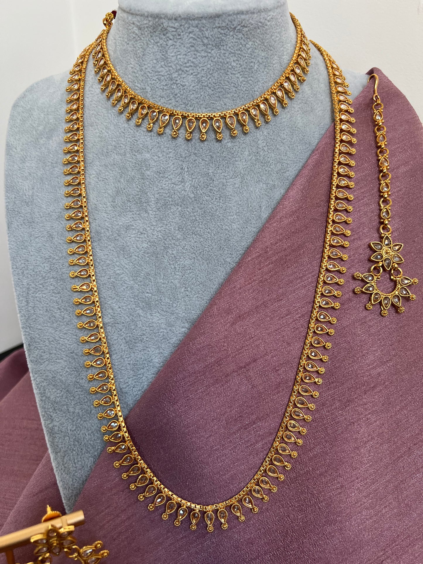 Antique gold plated long and short necklace set with a pair of earrings and uchi pattam/tikka N3001