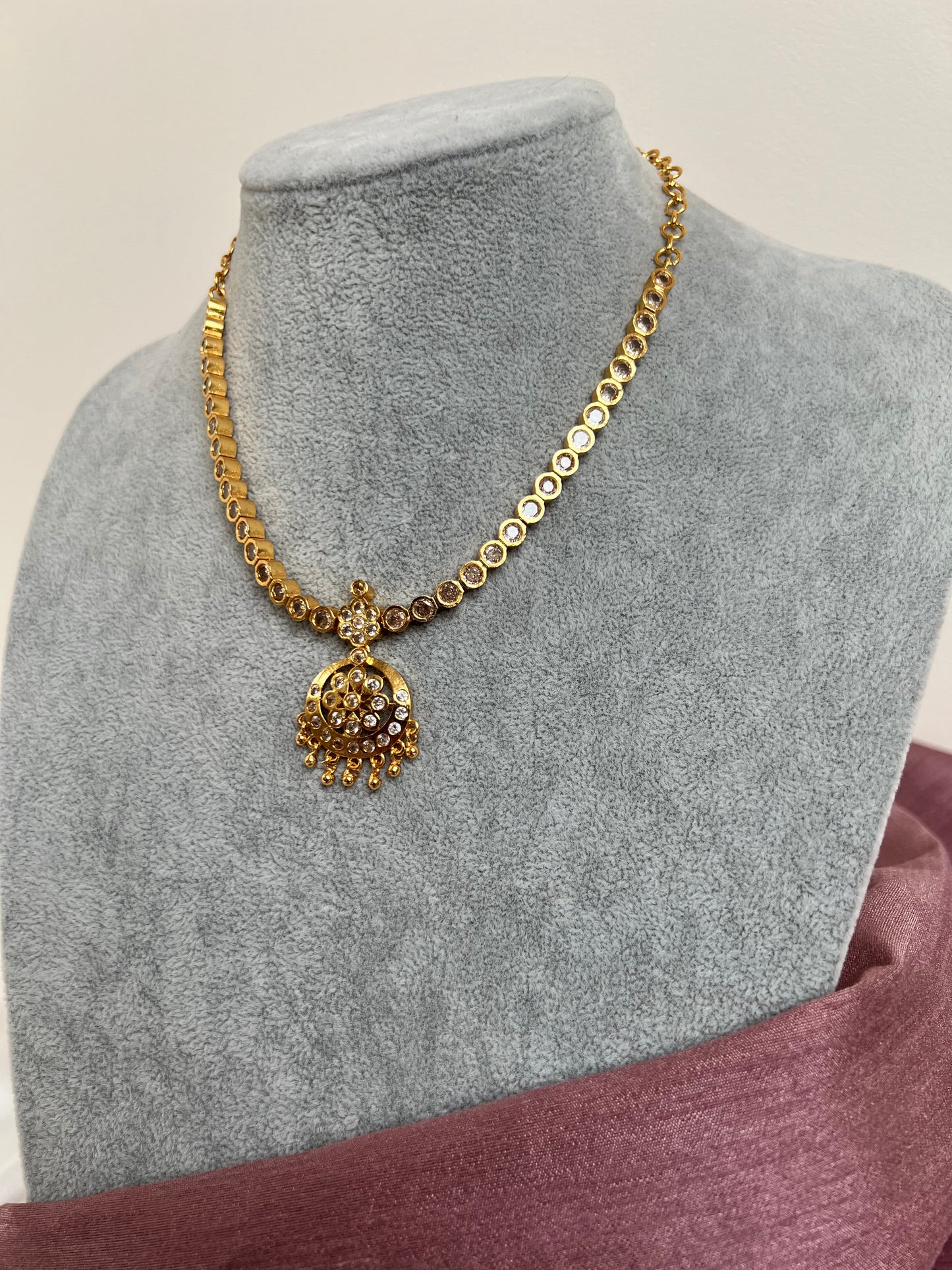 Short golden attigai with white stones N3158