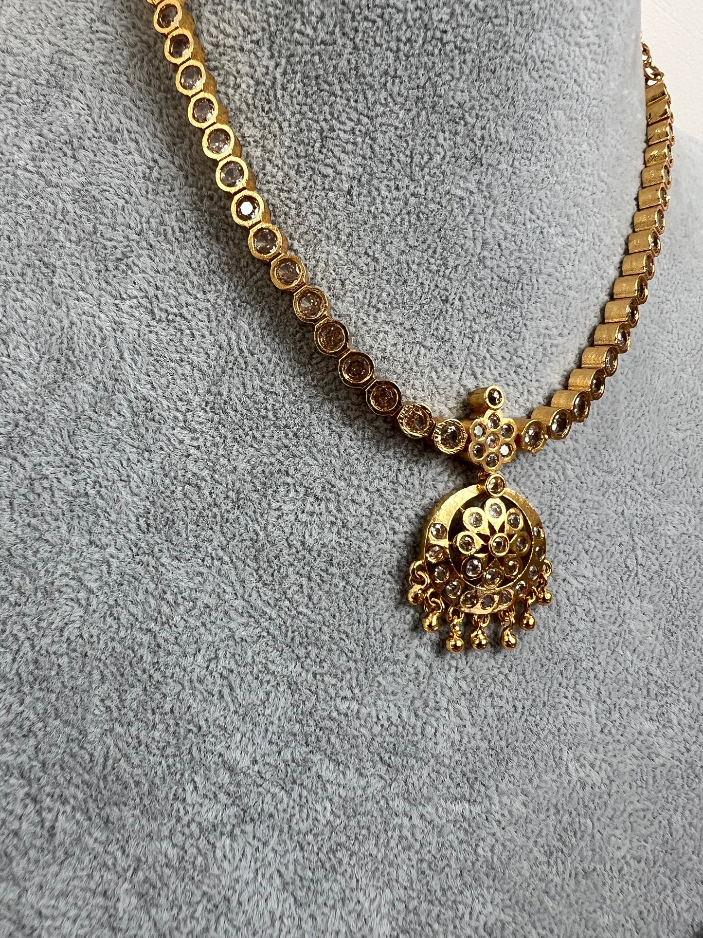 Short golden attigai with white stones N3158