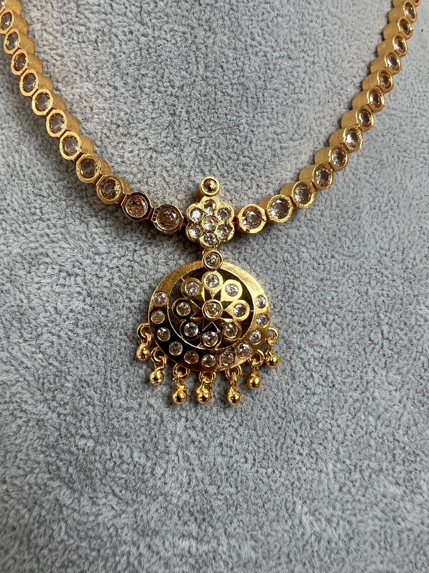 Short golden attigai with white stones N3158